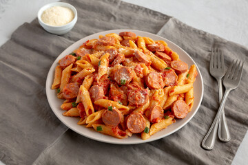 Homemade One-Pot Hot Dog Pasta on a Plate, side view.