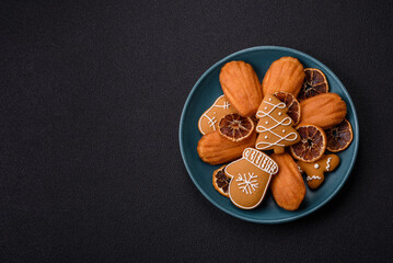 French classic madeleine sponge cake with elements of Christmas motifs