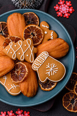 French classic madeleine sponge cake with elements of Christmas motifs