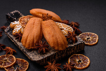 French classic madeleine sponge cake with elements of Christmas motifs