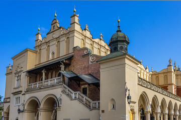 Fragments of the famous Sukiennice (Cloth Hall) on Rynek Glowny (Market Square). Sukiennice built in mid-thirteenth century. Sukiennice most important landmark of Krakow. Poland.