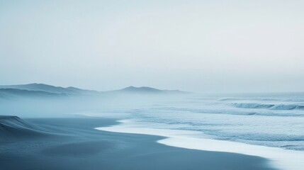 Seaside misty morning with gentle waves and