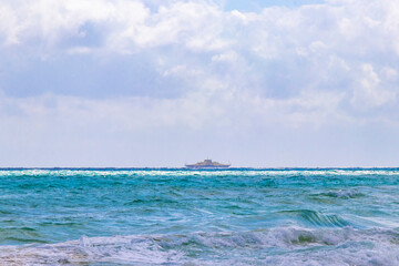 Tropical Caribbean beach clear turquoise water Playa del Carmen Mexico.