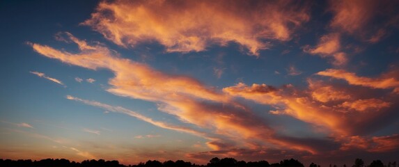Fototapeta premium A colorful sky with a blue and orange cloud.