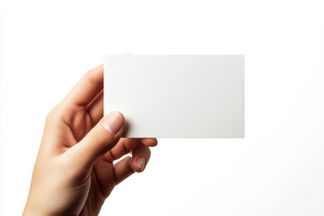 Obraz premium Minimalist Image of a Hand Holding a Blank White Paper Card