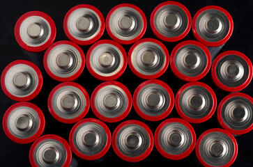 Top View Macro Image of Silver and Red AA Batteries
