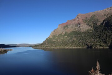 Scenic lake view with mountains and clear sky