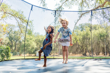 Girl's Jumping on a trampoline