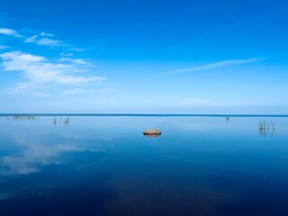 pure blue sea, quiet sea horizon, clear blue sky and blue sea reflection