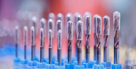 Banner Industrial shop, set drill bit for CNC machine cutting sheet metal, macro photo