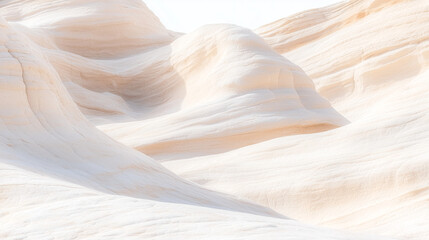 Obraz premium abstract desert landscape featuring smooth, weathered rock formations in soft, muted tones. The natural sunlight should cast gentle shadows across the rocks, highlighting their det