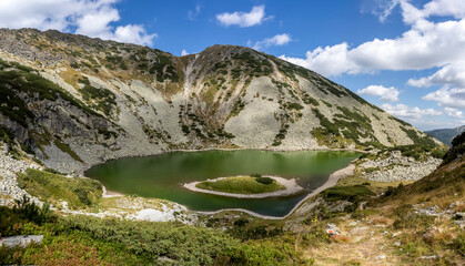Panoramic view of The Goat lake ( Taul Tapului ) in National Park Retezat, Romania. This is...