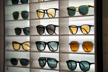 Sunglasses on the counter in optics store. Saint Petersburg, Russia - 24 July 2024