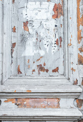 weathered, peeling wooden surface, with faded white paint, old light texture background