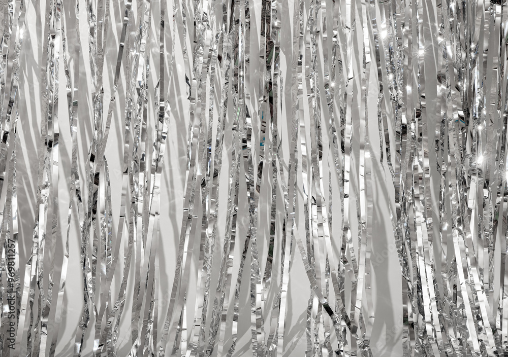 Aufkleber Shiny metallic silver background with crumpled, textured foil pattern. Reflective surface with light and wrinkles, creating an abstract and bright design. Perfect for holiday