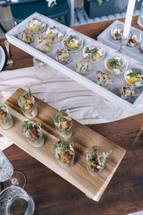 Elegant Catering Appetizers Displayed on Wooden Boards