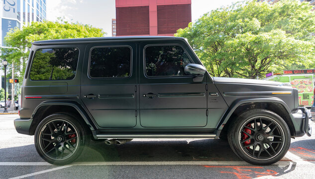 New York City, USA - May 19, 2024: 2021 Mercedes Benz AMG G63. Black car of Mercedes Benz AMG G63 parked outdoor. Mercedes Benz AMG G63, side view