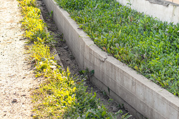 Concreted drainage ditch. Improvement of the drainage ditch. Strengthening walls of the ditch