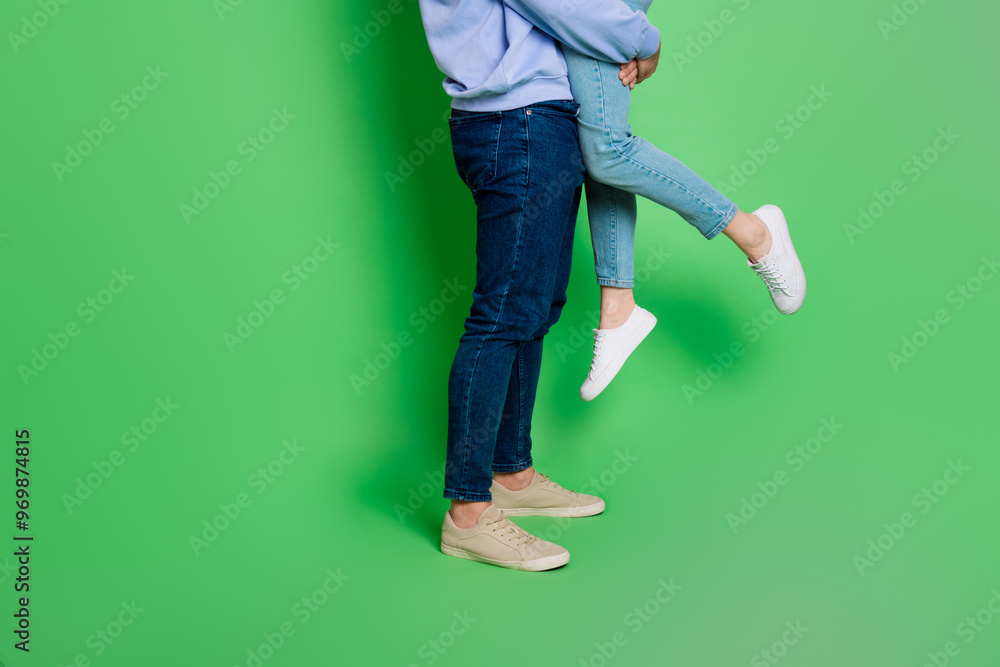 Sticker Cropped photo of cheerful happy people couple spending time together isolated on green color background