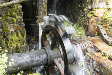 Water mill in operation, showing detailed components