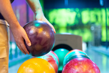 Friends enjoying a fun game of bowling at a vibrant alley