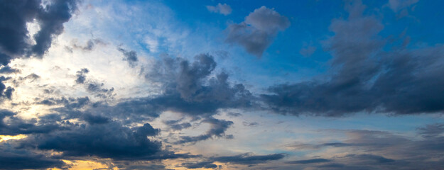 dramatic sky, dark clouds in blue sky after sunset