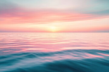 Obraz premium Sunset Over Calm Ocean Waters During Twilight, Creating a Serene Atmosphere at Dusk