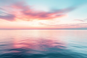 Obraz premium Sunset Over Calm Ocean Waters During Twilight, Creating a Serene Atmosphere at Dusk