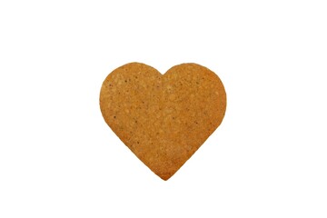 Undecorated gingerbread in a shape of heart isolated on white background