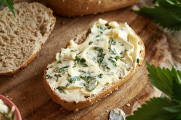 Nettle butter - homemade bread spread on a slice of sourdough bread