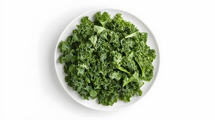 Fototapeta premium Fresh green kale on white plate - healthy organic superfood for salads and smoothies