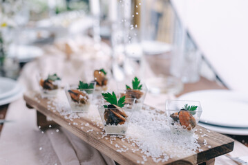 Gourmet Appetizers on Rustic Wooden Board
