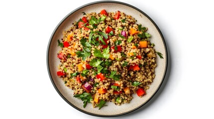Vibrant quinoa salad with fresh vegetables and herbs on plate