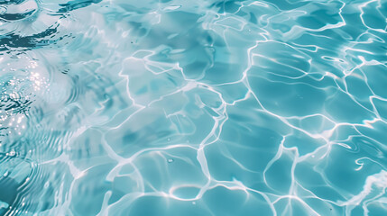 Obraz premium Blue water ripples in a swimming pool.