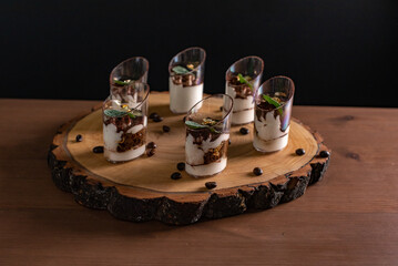 Elegant Rustic Layered Dessert Presentation on Wooden Board