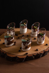 Elegant Rustic Layered Dessert Presentation on Wooden Board