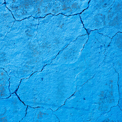 abstract line pattern on blue painted part of conrete with cracks