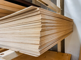 A stack of premiumgrade plywood sheets is perfectly prepared and available for various construction and craft projects, ensuring quality results