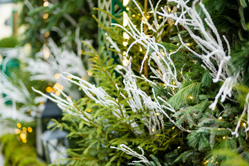 Christmas lights, trees and ornaments used as decorations at Festive season. Streets of Vilnius Old Town decorated for Christmas.