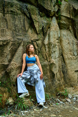 A young girl travels through the mountains