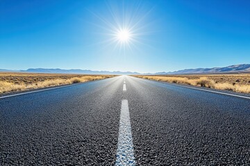 Fototapeta premium Sunny road with blue sky horizon
