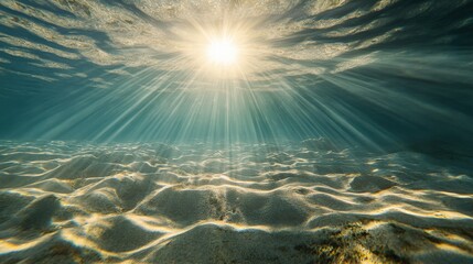 Fototapeta premium Tranquil Underwater Scene with Sunbeams Filtering Through Water, Illuminating Ocean Floor