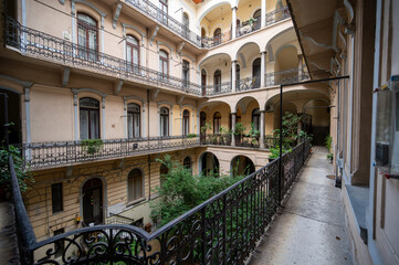 Highway to Budapest, Hungary. August 24, 2022. A railing house in the historic center: the gallery balcony goes all the way around the internal courtyard.