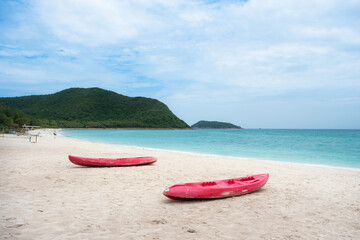 cayak on white sand beach