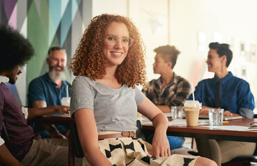 Portrait, smile and woman with glasses, cafeteria and breakfast with group, ice coffee or confident. Happy, employee and person in lunch meeting, smoothie and planning of project, stylist or creative