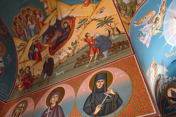 Obraz premium Interior view of Agios Nikolaos orthodox church featuring religious frescoes and icons. Paralimni, Cyprus