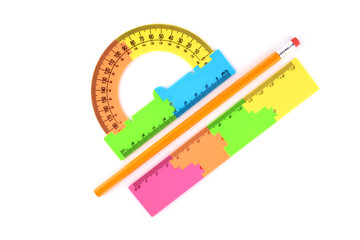 plastic ruler, protractor and a simple pencil with an eraser