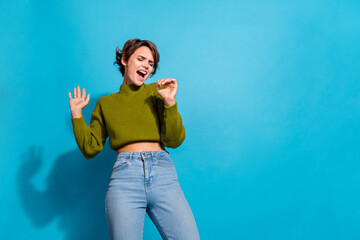 Photo of good mood funny cute girl wear trendy clothes have fun karaoke club sing song empty space...