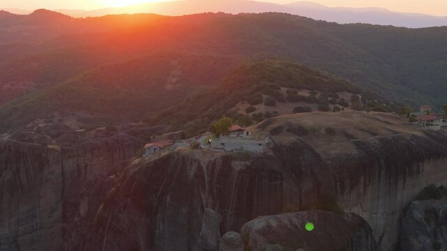 Greece Meteora region unique mountain formations and monasteries on it 4k videos taken with drone at sunrise