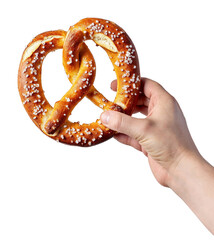 A hand holding a freshly baked German pretzel with coarse salt on a transparent background.